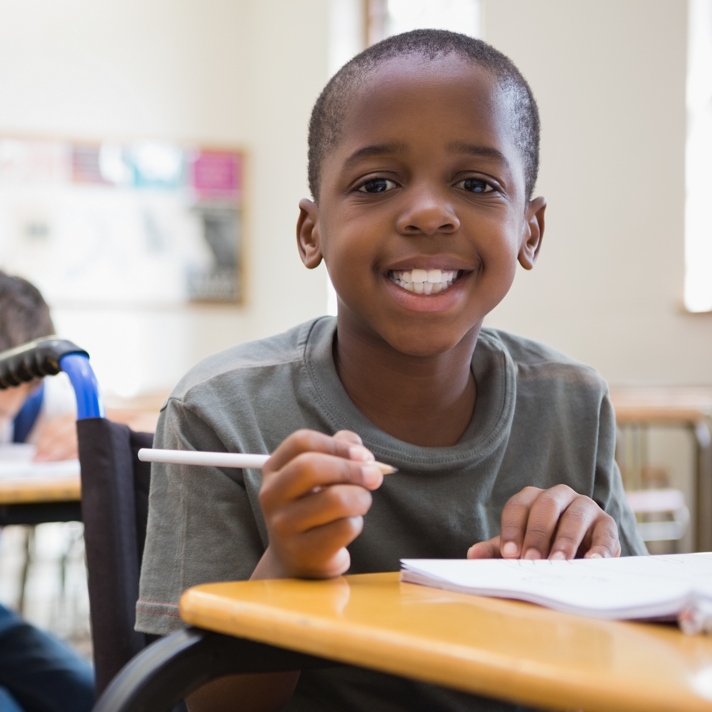 Smiling student in wheel chair