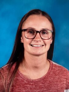 Headshot of Jacalyn Jenkins, smiling at the camera.