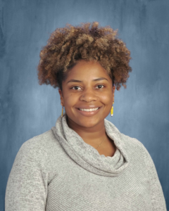 Headshot of Dasianee Gavin, smiling at the camera.